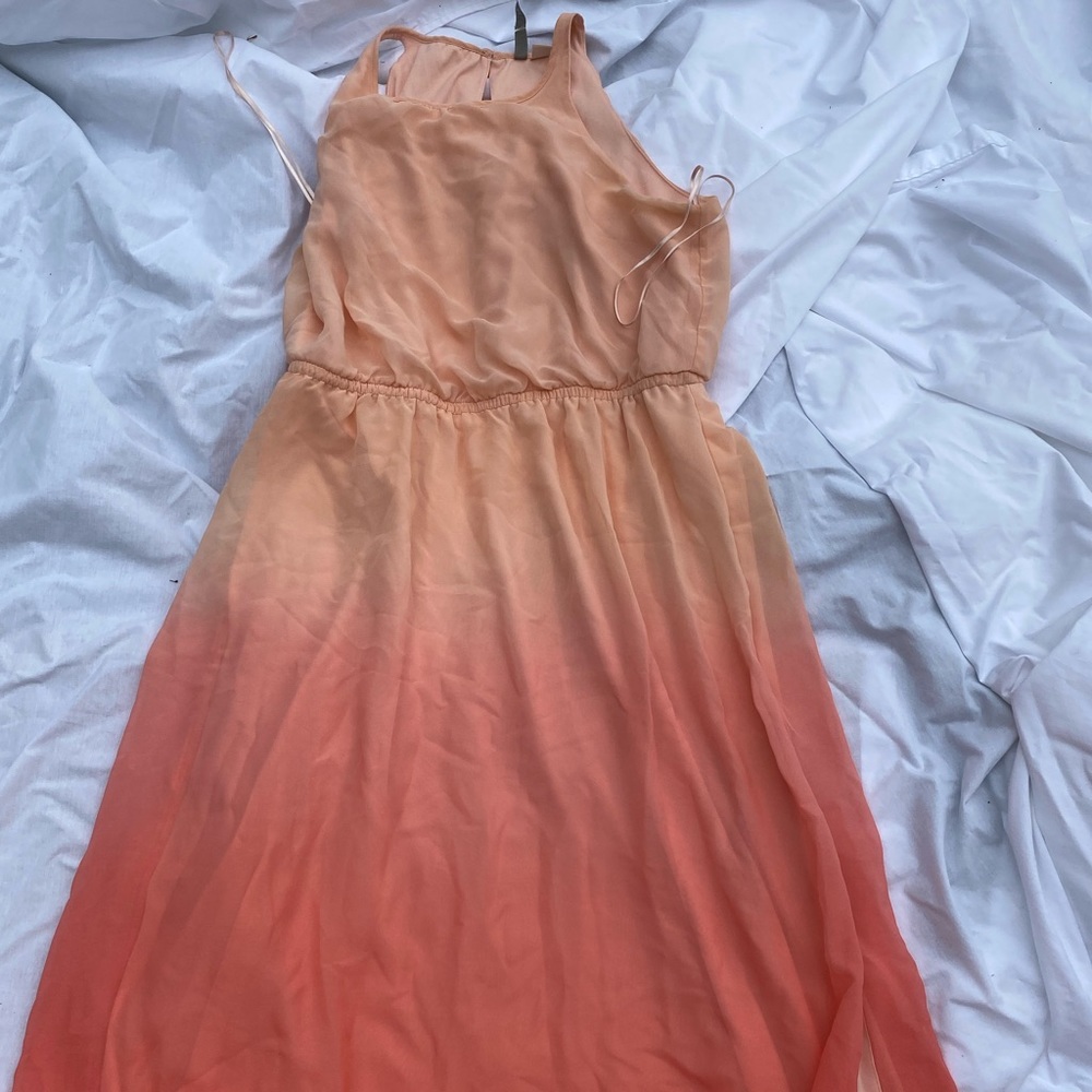 Floor length ombré dress with slit.